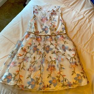 Size 6 dress. Never worn but tags taken off.